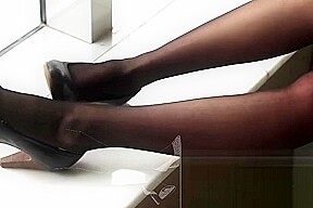#64 black stockings on window seat