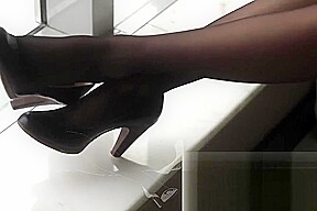 #64 black stockings on window seat