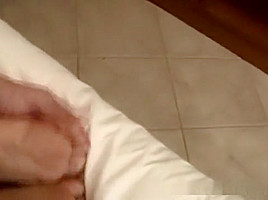 Adorable Asian babe tied up on a bed