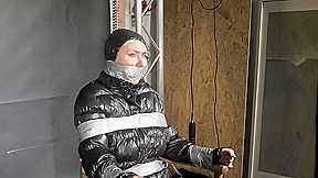Alice Taped To A Chair And Tapegagged In Shiny Nylon Downjacket