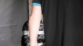 Alice Taped To A Chair And Tapegagged In Shiny Nylon Downjacket