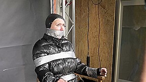 Alice Taped To A Chair And Tapegagged In Shiny Nylon Downjacket