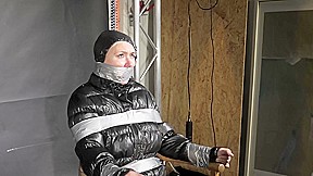 Alice Taped To A Chair And Tapegagged In Shiny Nylon Downjacket