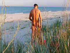 Amateur couple got caught having sex on the beach by  