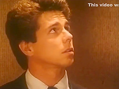 Amber Lynn fucks Peter North in a elevator
