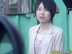 Asian Professional Peeing On The Street