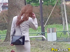Asian Professional Peeing On The Street