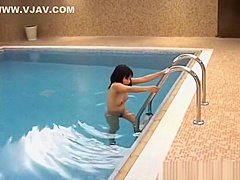 Asian babe stripping outdoors