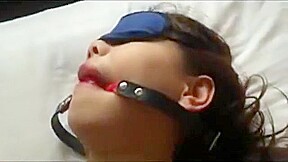 Asian hogtied and blindfold
