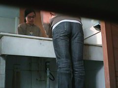 Asian nerdy chick takes a leak and gets on hidden pee cam video