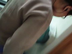 Asian nerdy chick takes a leak and gets on hidden pee cam video