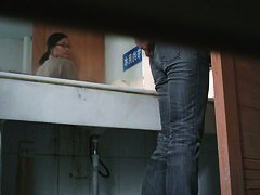 Asian nerdy chick takes a leak and gets on hidden pee cam video