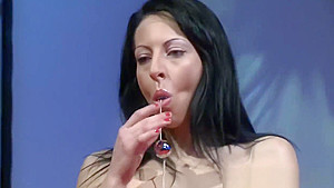 Attractive stripper massages a guys cock on the stage