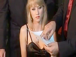 Bambola teased by three men