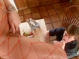 Big Breasted Babe In Red Fishnets Gets Her Feet And Her Pussy Licked