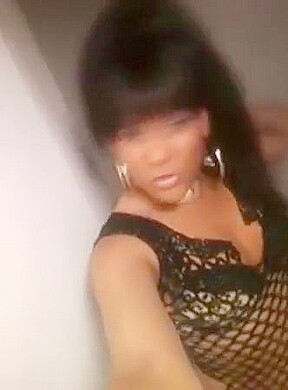 Black tranny going out to the club