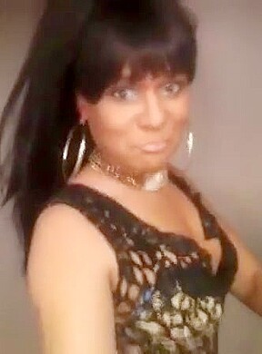 Black tranny going out to the club