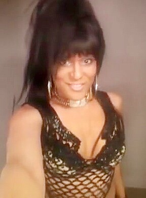 Black tranny going out to the club