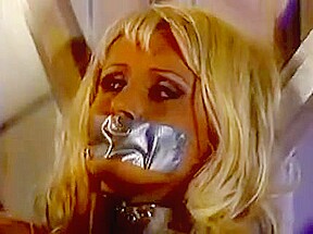 Blonde with big tits bound and made to submit