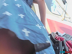 Brunette accidentally flashes thong in candid upskirts