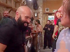 Brunette slave gets facials in public