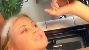 Busty babysitter fucks in the kitchen