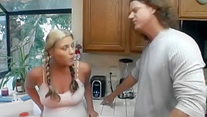 Busty babysitter fucks in the kitchen