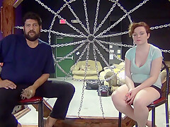 Busty redhead gets tied up with rope and teased