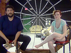 Busty redhead gets tied up with rope and teased