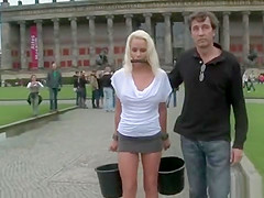 Busty tied blonde fucked in public