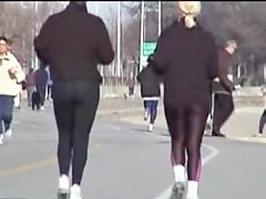 Candid babes in spandex pants are running in the street 01zc