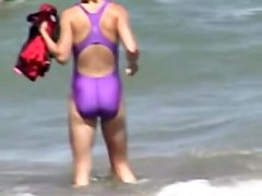 Candid girl in bikini of the nice lilac color 06o