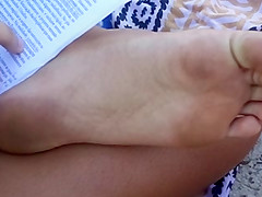 Candid soles at beach - teen 18+ studying