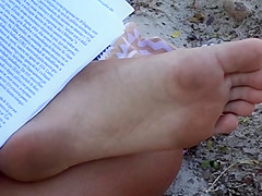 Candid soles at beach - teen 18+ studying