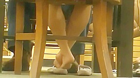 Candid teen 18+ girl feet in the library