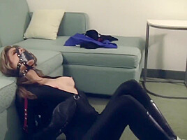 Candle In Sexy Catsuit Bound And Gagged