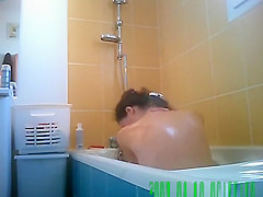 Chick with trimmed pussy washes body