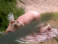 Chubby woman nude through window
