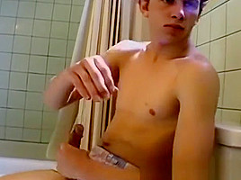 Cigar smoker jerks off in the bathroom and cums solo