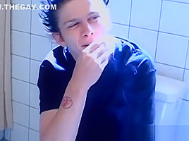 Cigar smoker jerks off in the bathroom and cums solo