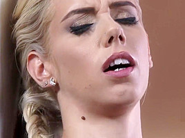Classic blonde teeasing by the door before fingering her wet