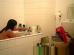 College girl with big tits takes a bath
