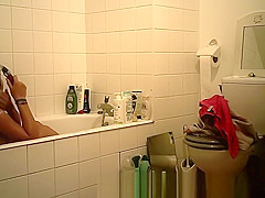 College girl with big tits takes a bath