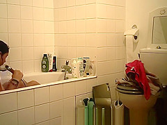 College girl with big tits takes a bath