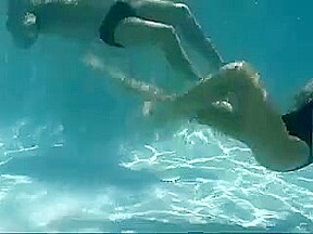 Couple enjoys oral sex under water