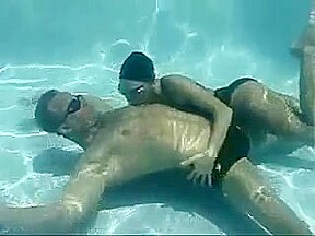Couple enjoys oral sex under water