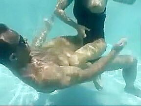 Couple enjoys oral sex under water