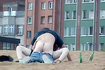 Couple having sex on the beach