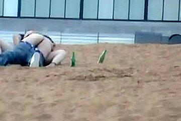 Couple having sex on the beach