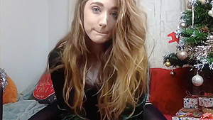 Cute Girl rides dildo and cums on Christmas